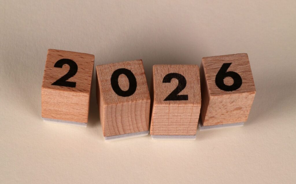 Wooden blocks arranged to show the year 2026, perfect for New Year themes.